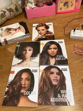 Pivot Point Cosmetology textbook bundle, 11 Textbooks